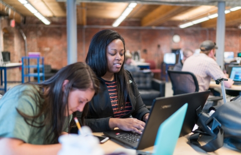 University of New Hampshire Manchester students study together