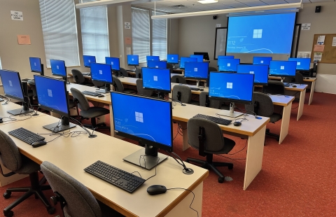 Hewitt 301 classroom photo with student computers displayed