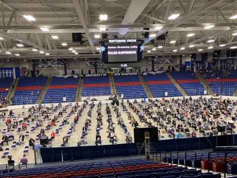 A photo of the New Hampshire House of Representatives assembling at the Whittemore Center Area at the University of New Hampshire. 