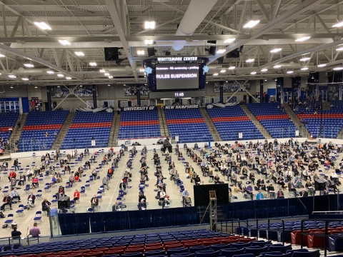 A photo of the New Hampshire House of Representatives assembling at the Whittemore Center Area at the University of New Hampshire.