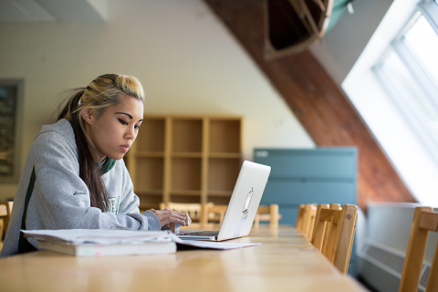 student working on laptop